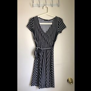 Black and white striped faux wrap dress